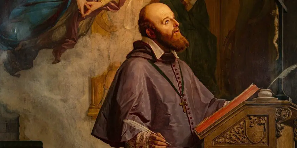 Pintura de São Francisco de Sales, um homem com uma barba expressiva, vestido com uma túnica e segurando um livro em um ambiente religioso. A imagem retrata sua devoção e conexão espiritual. Missa em honra a São Francisco de Sales, patrono dos jornalistas e escritores, acontece em Paranaguá