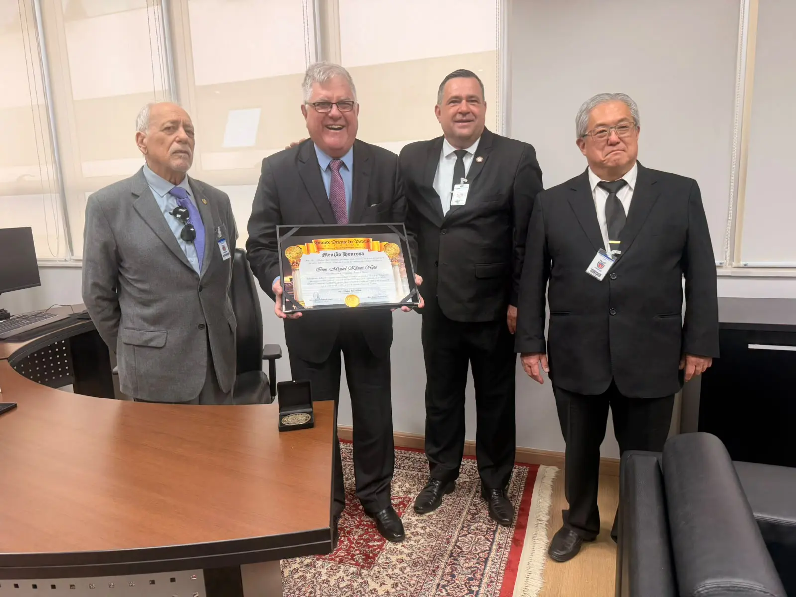 Comitiva do Grande Oriente do Paraná. Da esquerda para direita: Roberto Fonseca, Miguel Kfouri Neto, Gil Alessandro Zwir eRoberto Kazuo Iwakura